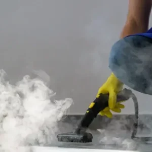 professional-cleaning-service-person-using-steam-cleaner-office